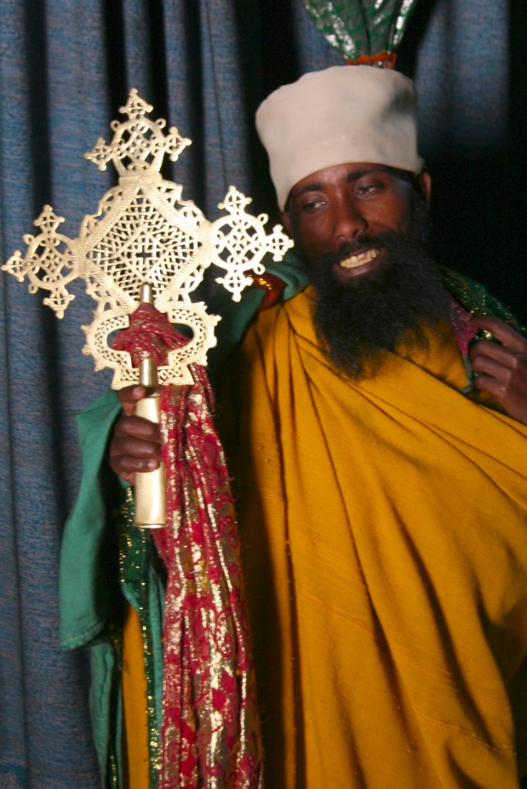 Priest with Ethiopian Orthodox cross, Lalibela, Ethiopia, Africa